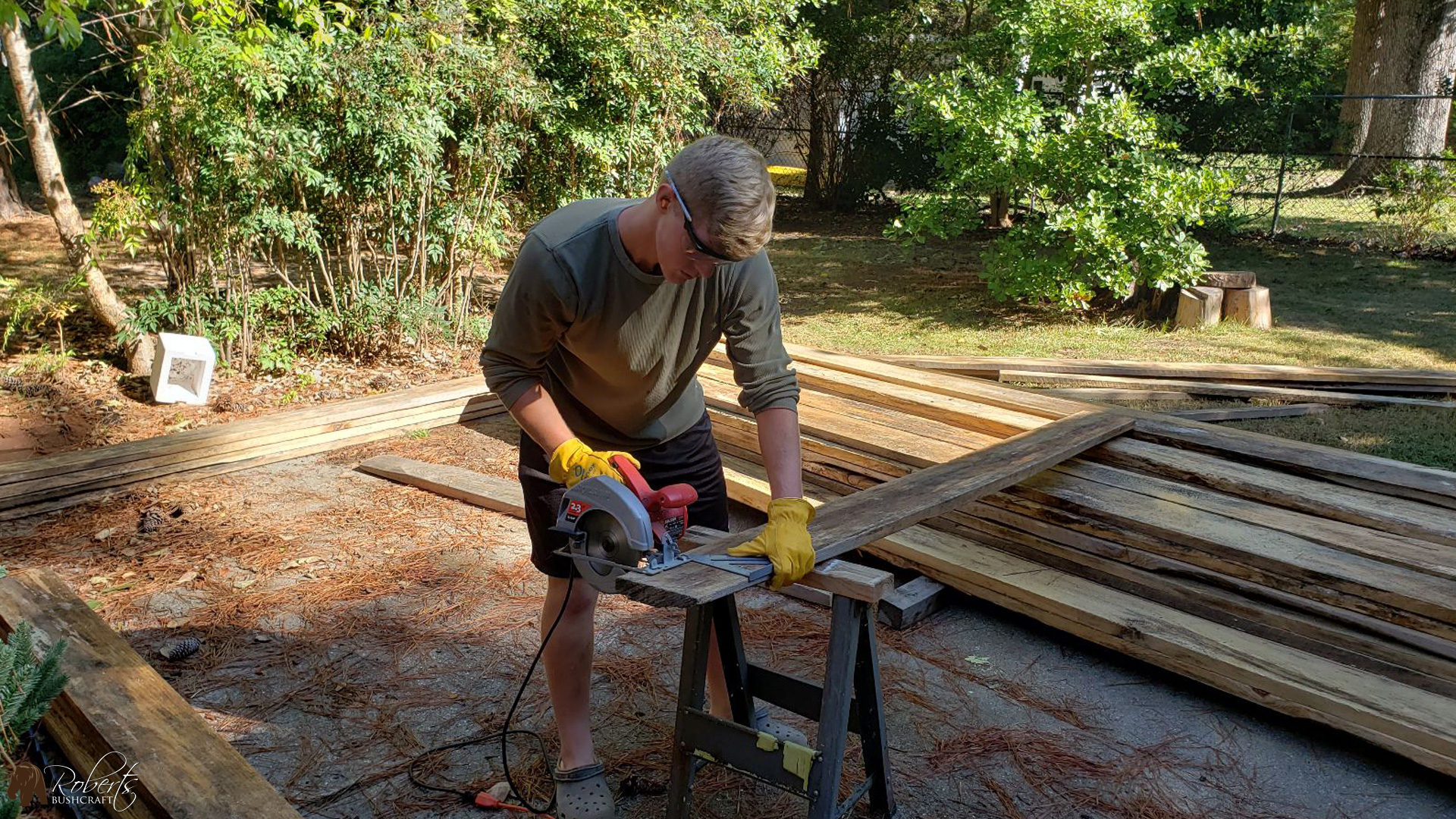 Cutting pine lumber for the porch deck