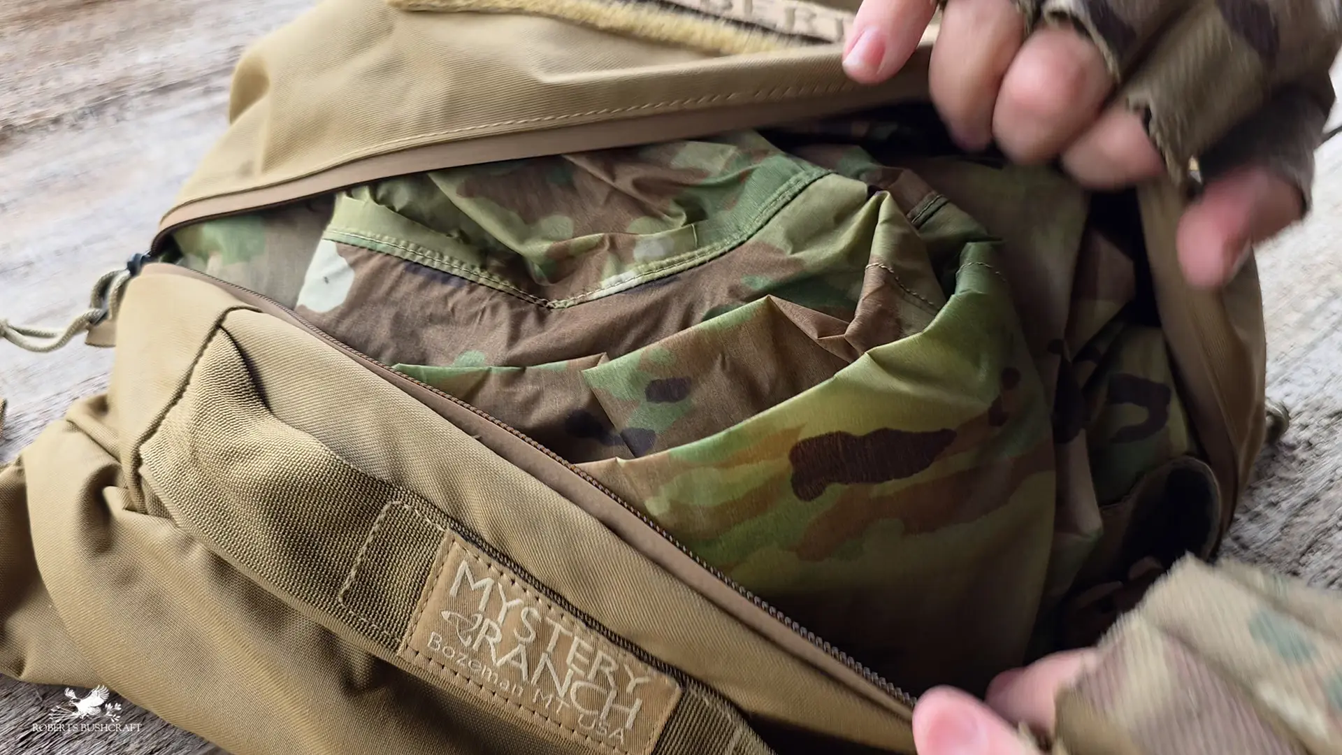 ORC Industries military poncho inside of the removable daypack lid