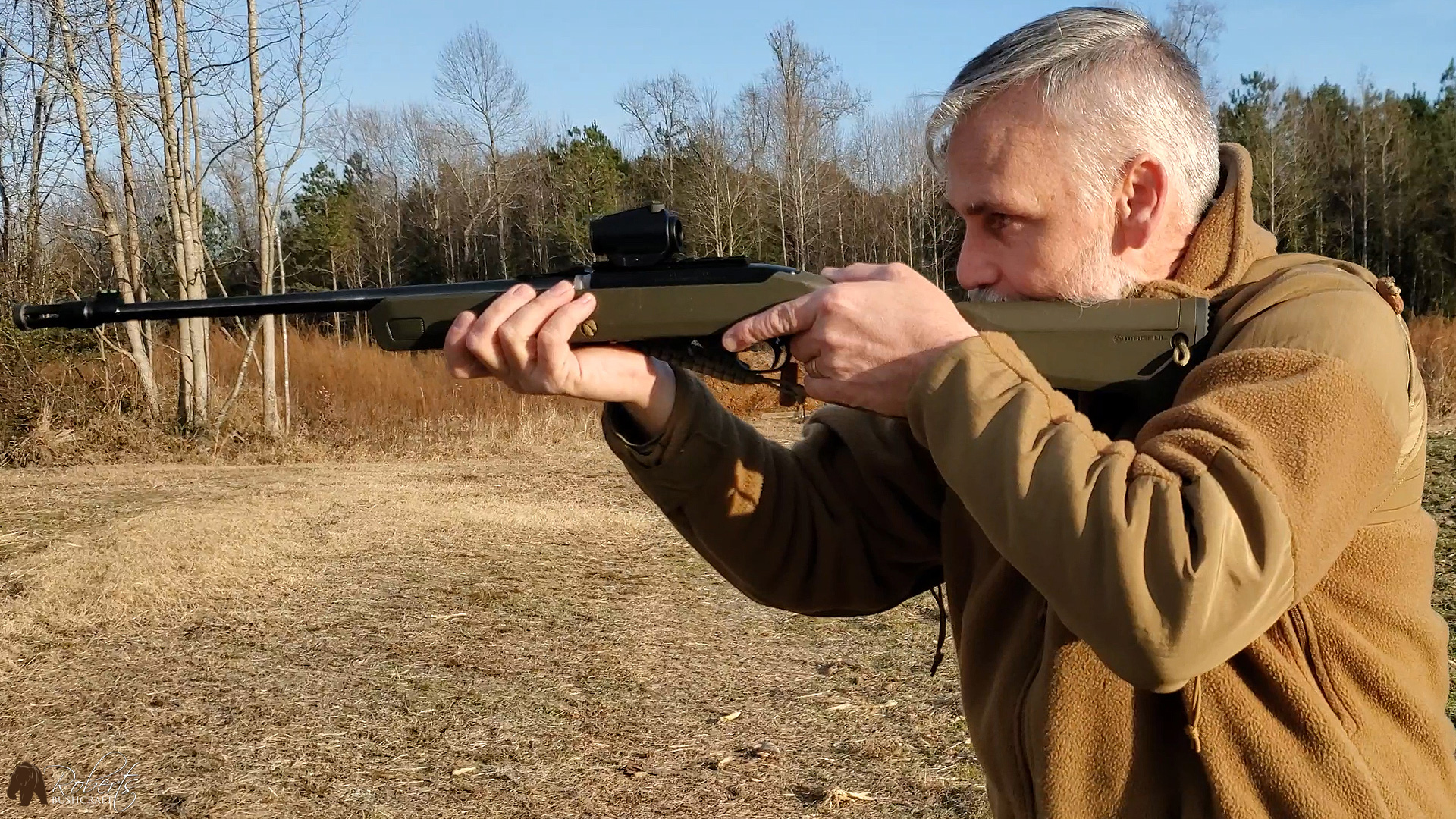 Taking aim with a Ruger 10/22 takedown rifle