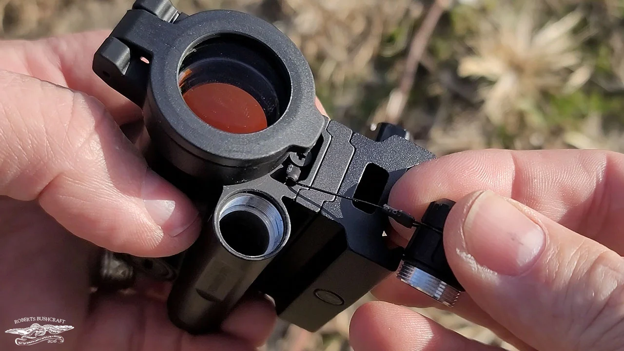 SIG ROMEO 7s battery cover is tethered to the body of the optic