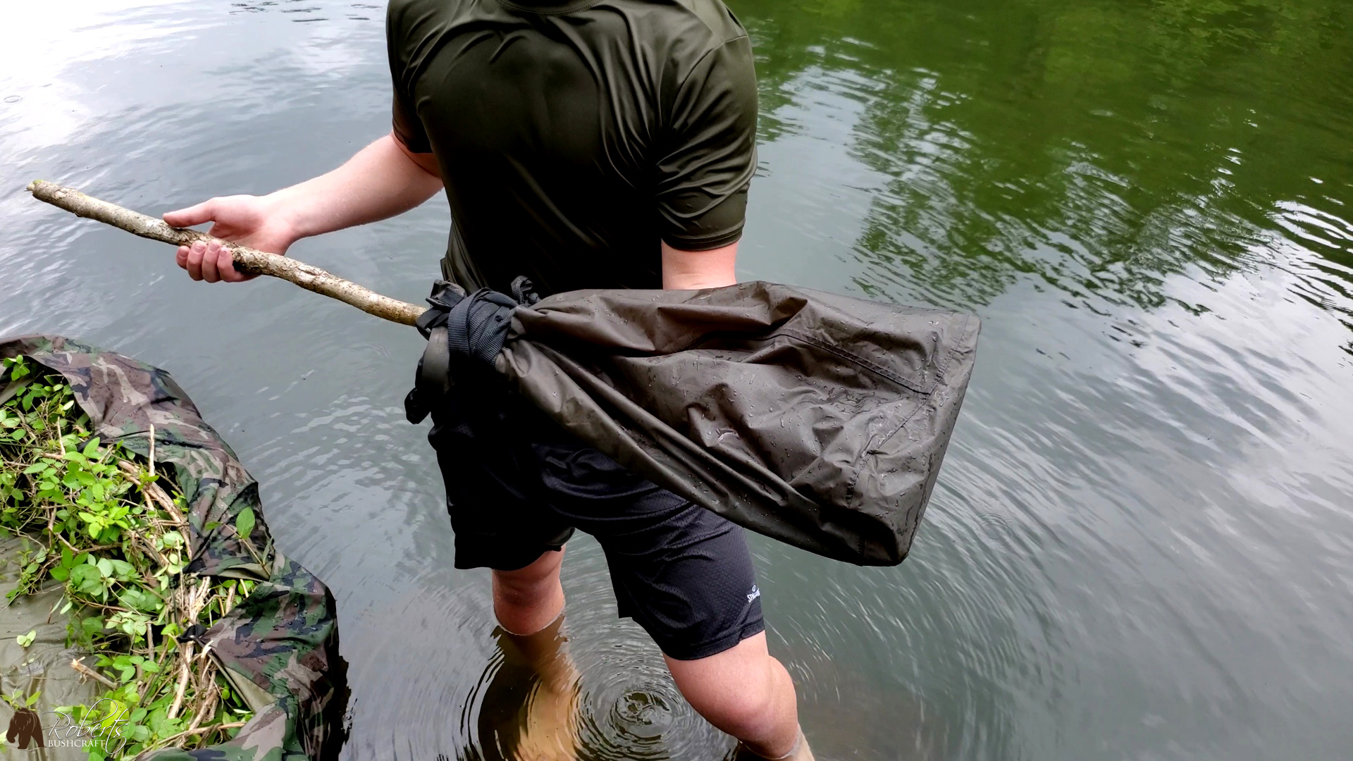 raft paddle made out of a dry bag
